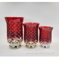 red colored large glass candlestick holder